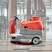 Side view of BT-AAWS150 Electric Floor Scrubber operating in a commercial lobby